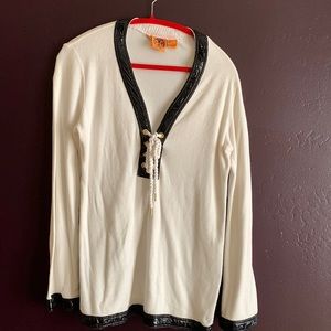 Tory terry tunic with faux leather trim and rope closure.